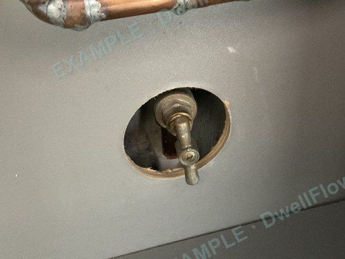Stop tap and incoming pipe — Under the kitchen sink